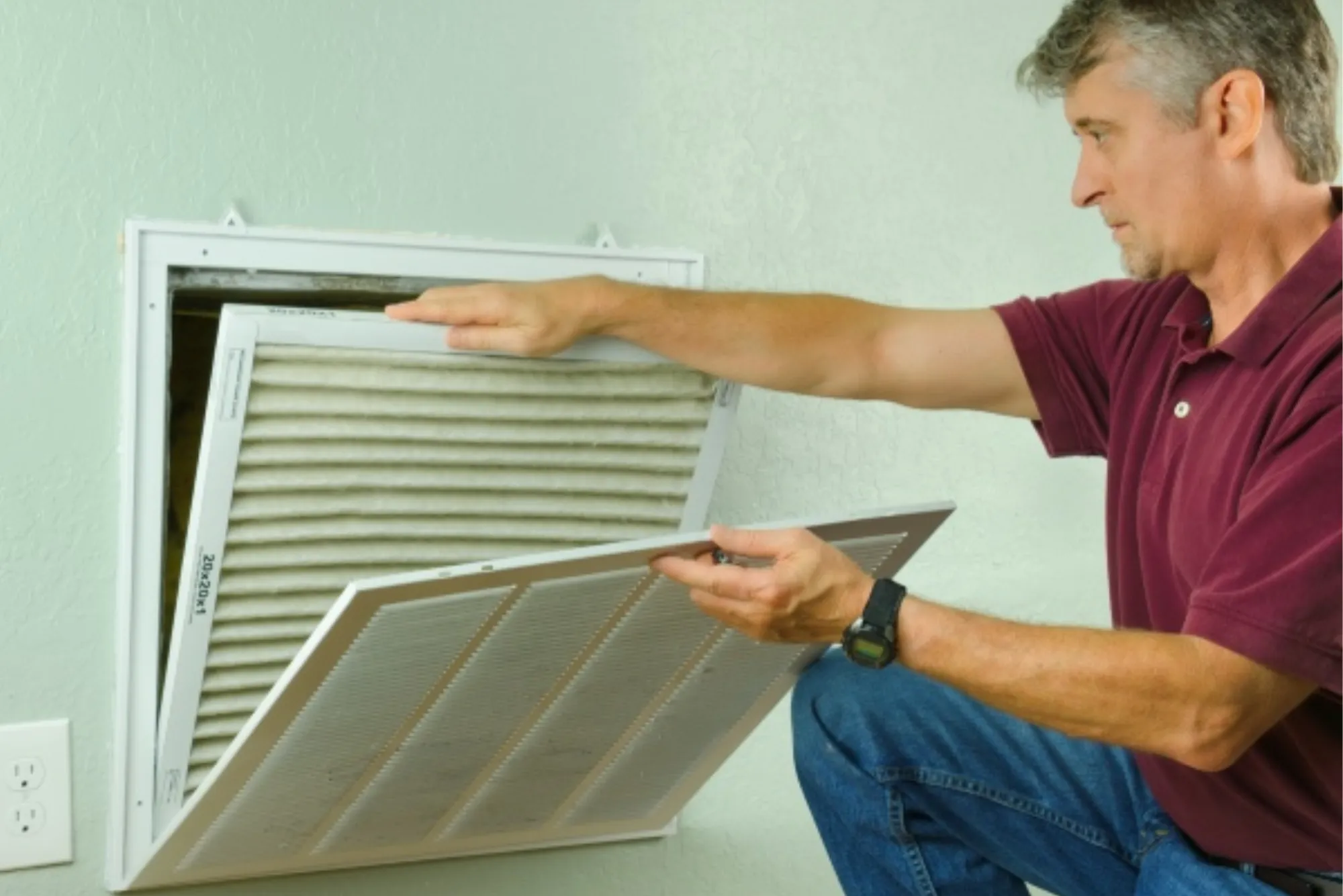 What is the role of AC condenser coils